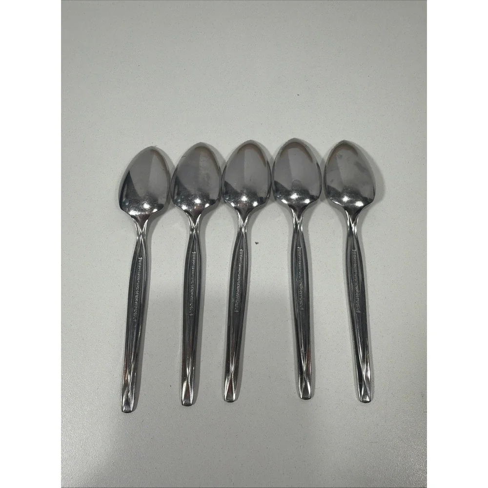 5pc. lot of Vintage Wm. Rogers & Son Serrated Spoon